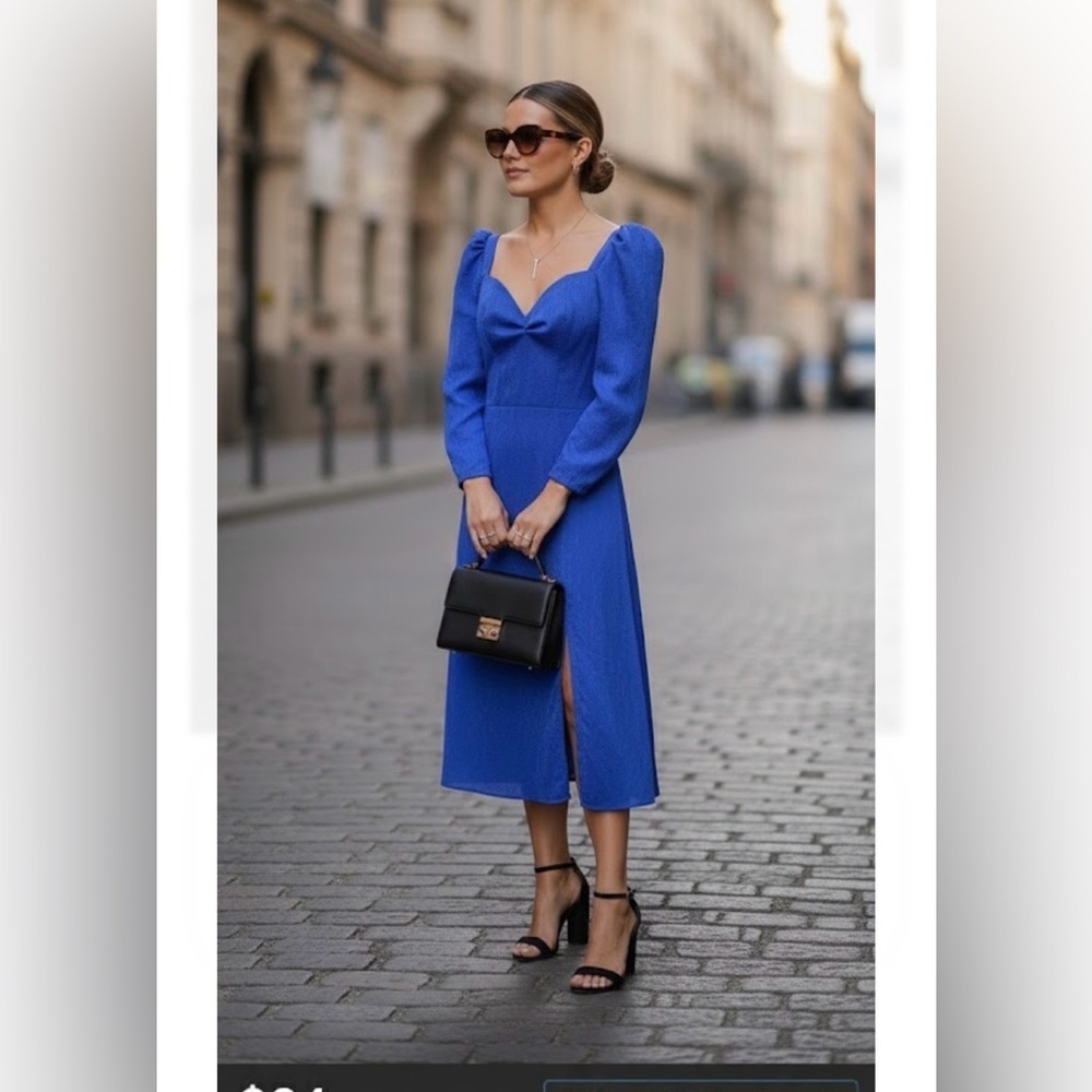 Rendoll Lagos.Blue Sweetheart Neckline Gown with Puff Sleeves